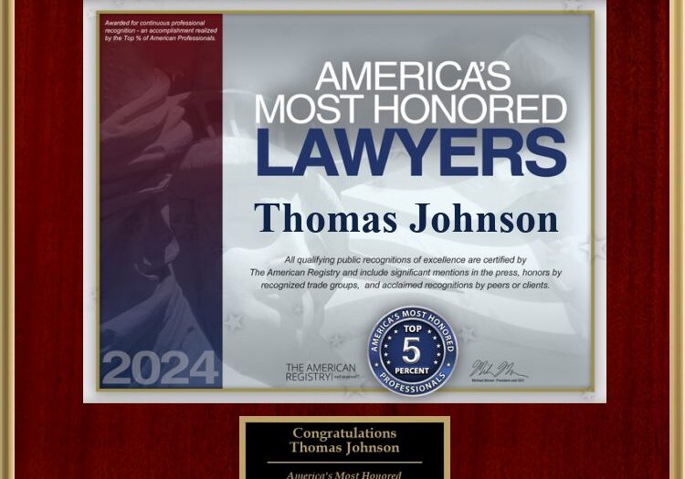 Plaque awarding Thomas Johnson as one of America's Most Honored Lawyers 2024.